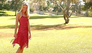 Polka dots dress is the only thing covering her perfect body